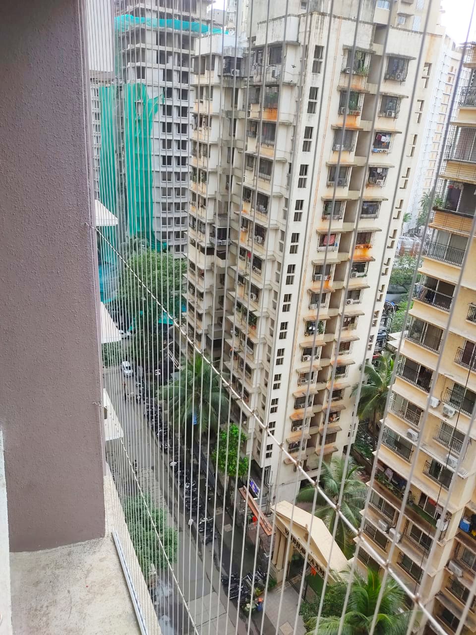 invisible grill installation in hiranandani powai