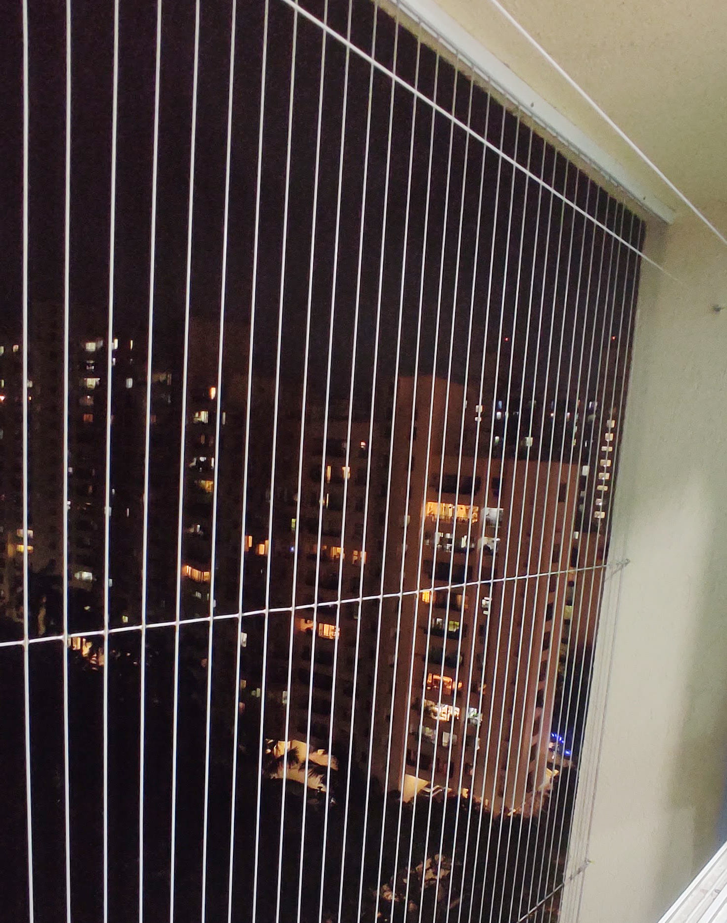 Invisible grill makers in Powai offering balcony and window safety solutions